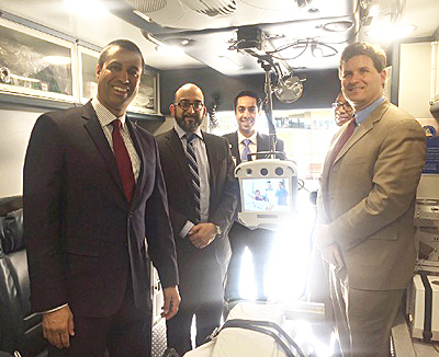 Chairman Pai with Dr. Shazam Hussain of the Cleveland Clinic's telestroke team, among others.