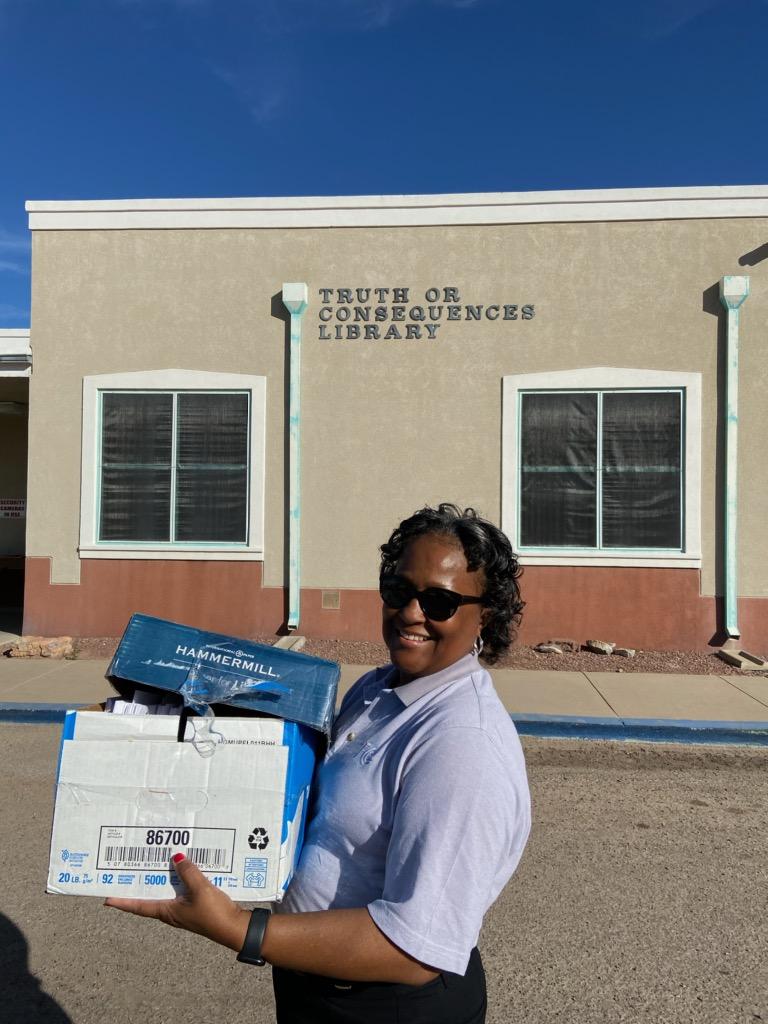 FCC Consumer Outreach Specialist Alma Hughes prepares to drop off consumer tip cards at the public library in Truth or Consequences, NM on Thursday, Jan. 30, 2020.